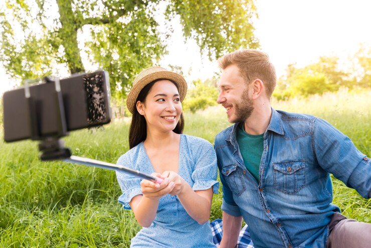multiracial adult couple taking selfie with smartphone 23 2148195916